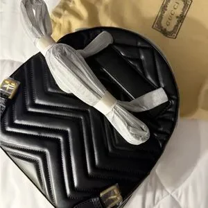 Gucci Black Chevron Backpack with Gold Accents Gucci Black GG Marmont Backpack (€1.385) ❤ liked on  main image 4